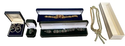 Lot 1487 - A gilt metal red stone set Middle Eastern...