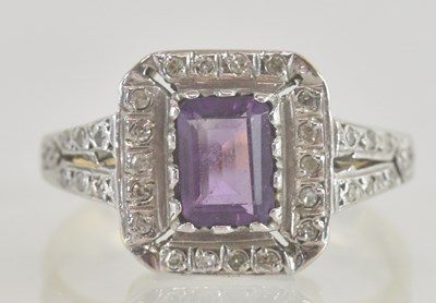 Lot 1339 - A 9ct gold amethyst and diamond set ring, the...
