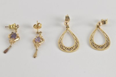 Lot 1455 - Two pairs of 9ct gold earrings, one pair set...