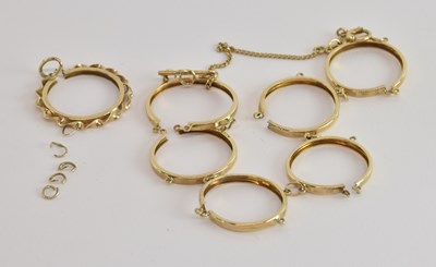 Lot 1191 - A 9ct gold coin bracelet mount and a coin...