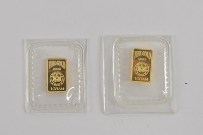 Lot 1202 - Two sealed 1g .999 gold ingots, combined...