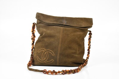 Lot 660 - CHANEL; a circa 2000 brown suede CC Tortoise...