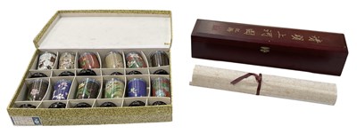 Lot 645 - A modern cased set of twelve Chinese gilt...