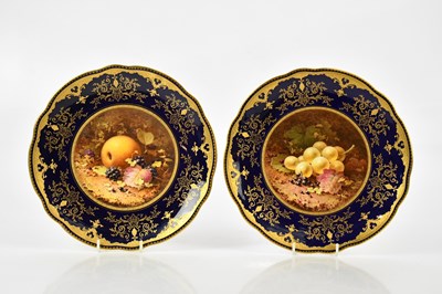 Lot 1625 - COALPORT; a pair of circa 1900 hand painted...