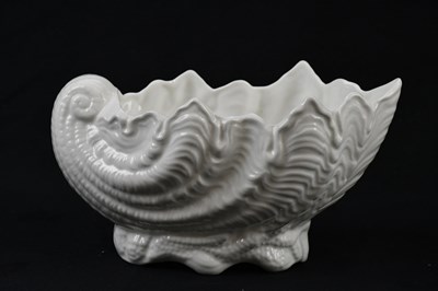 Lot 1669 - COALPORT; a Blanc de Chine ceramic planter in...