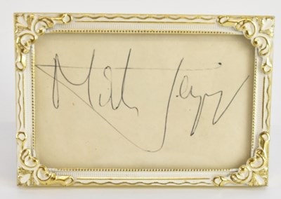 Lot 486 - MICK JAGGER; a small easel back photograph...