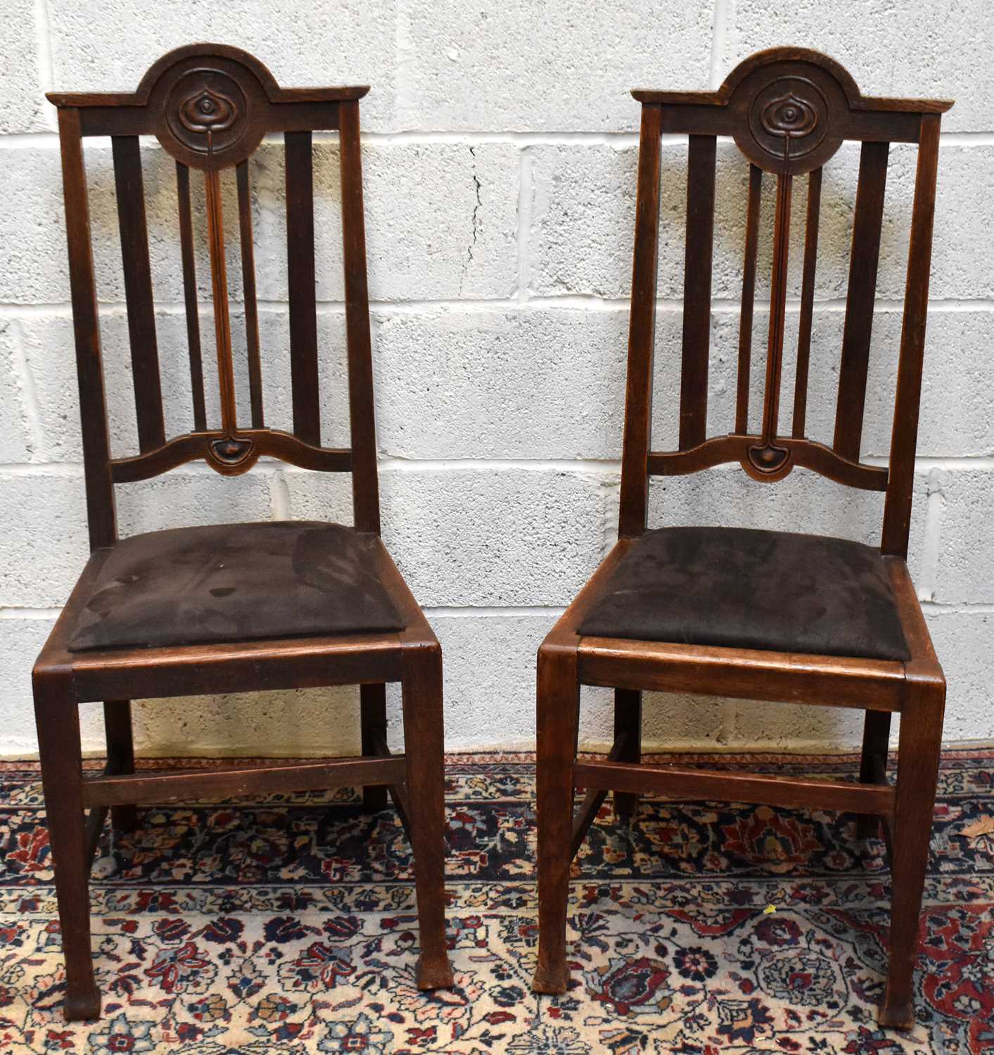 Lot 1698 A set of nine oak Art Nouveau style dining