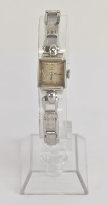 Lot 1734 - OMEGA; an early 20th century stainless steel...