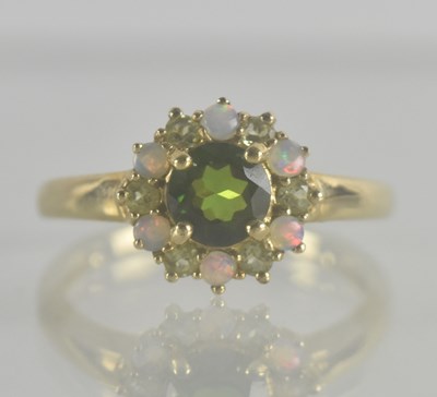 Lot 1332 - A 9ct gold opal diopside cluster ring in a...