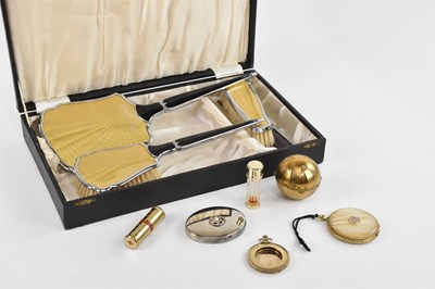 Lot 725 - ESTEE LAUDER; a 'Honey Glow' circular compact...