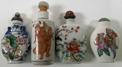 Lot 334 - Four Chinese porcelain snuff bottles,...
