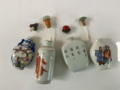 Lot 334 - Four Chinese porcelain snuff bottles,...
