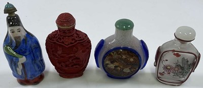 Lot 335 - A Chinese Peking glass inspired snuff bottle,...