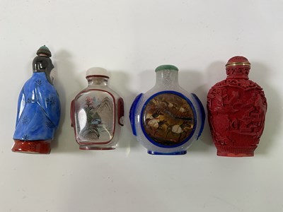 Lot 335 - A Chinese Peking glass inspired snuff bottle,...