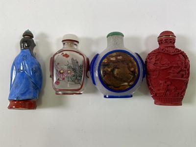 Lot 335 - A Chinese Peking glass inspired snuff bottle,...