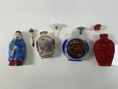 Lot 335 - A Chinese Peking glass inspired snuff bottle,...