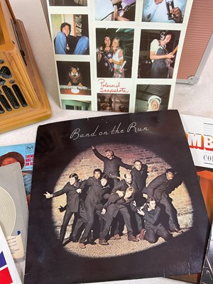 Lot 147 - A modern record and CD player, with albums and...