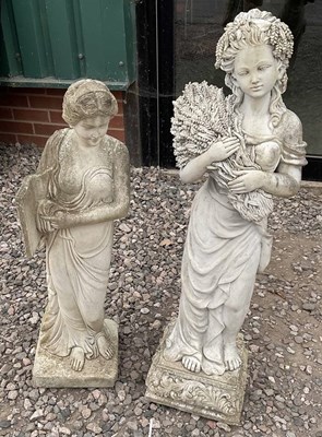 Lot 684 - Two resin garden statues, depicting a girl...