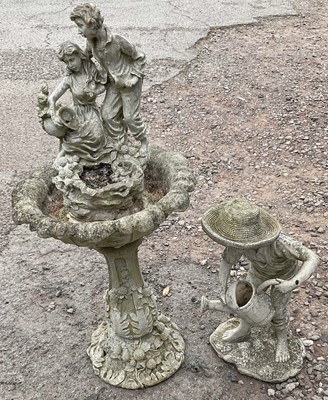 Lot 685 - A resin garden water feature, height 106cm,...