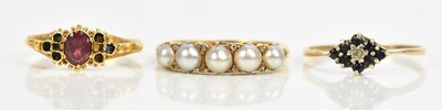 Lot 437 - A yellow metal seed pearl set five stone dress...
