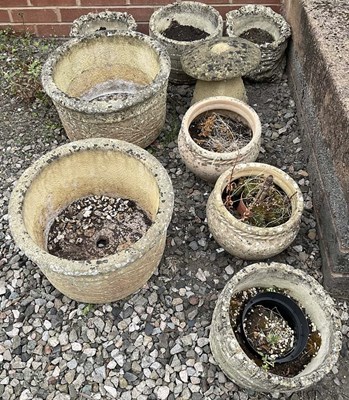 Lot 669 - A quantity of composite stone planters,...