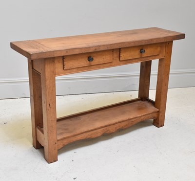 Lot 1022 - A modern pine two drawer hall table, height...
