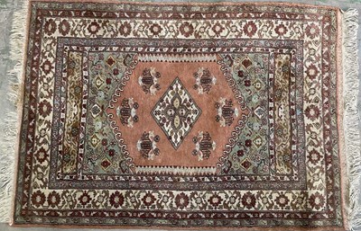 Lot 667 - A European rug, with a diamond central motif,...