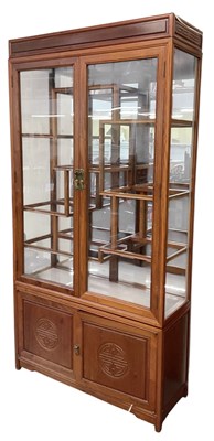 Lot 22 - A modern Chinese carved hardwood display...