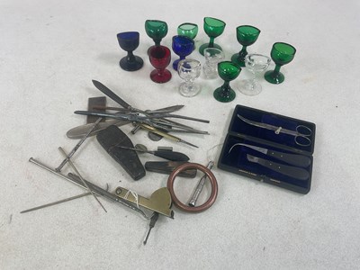 Lot 105 - A group of Victorian eye baths including three...