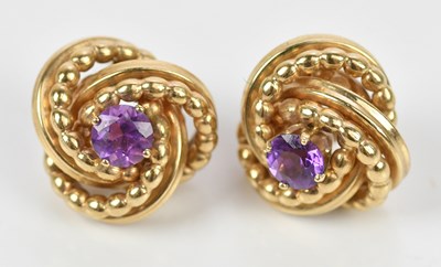 Lot 191 - A pair of 9ct gold amethyst set knot earrings,...