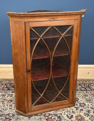 Lot 2987 - A George III pitch pine hanging corner...