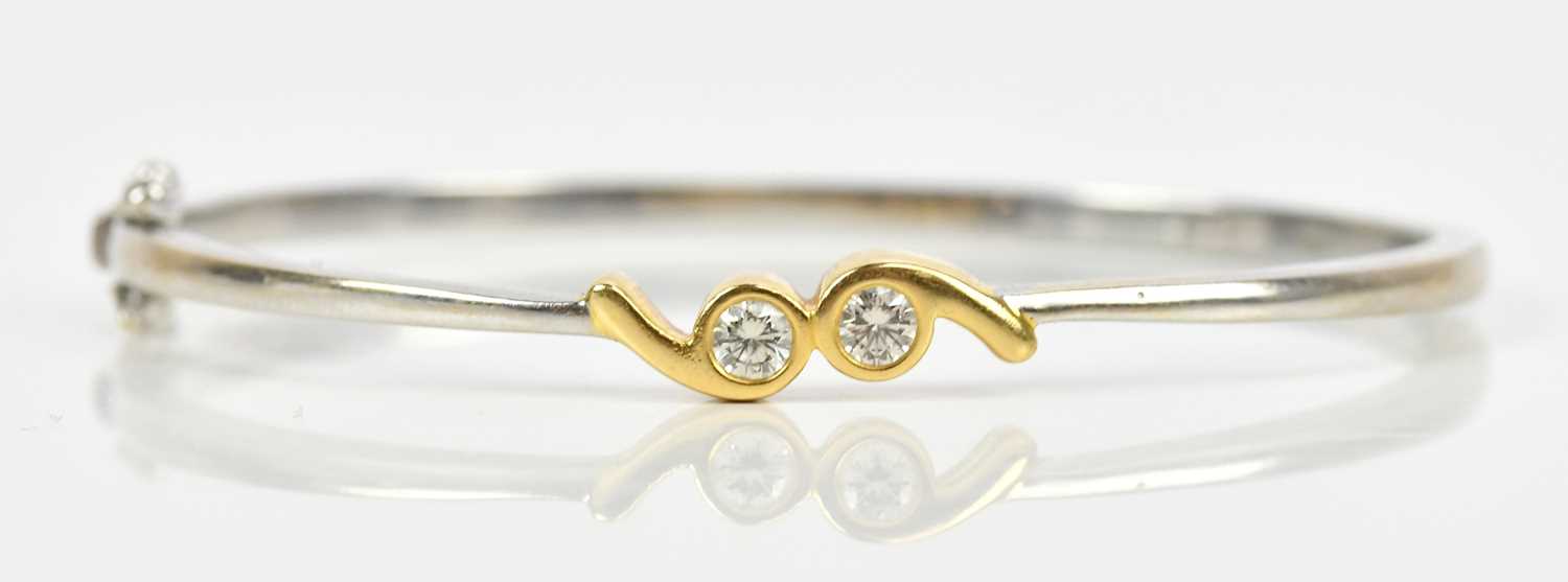 Lot 21 - A yellow and white metal diamond set hinged...