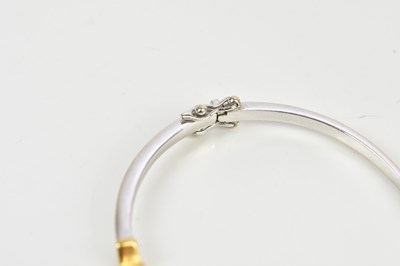 Lot 21 - A yellow and white metal diamond set hinged...