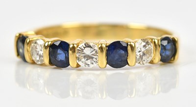 Lot 361 - An 18ct yellow gold diamond and sapphire seven...