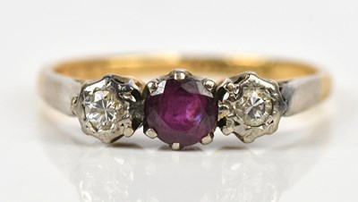 Lot 410 - A yellow and white metal three stone illusion...