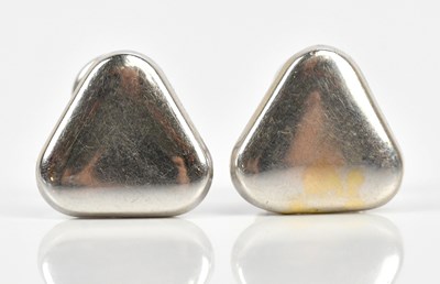 Lot 176 - A pair of white metal triangular shaped...