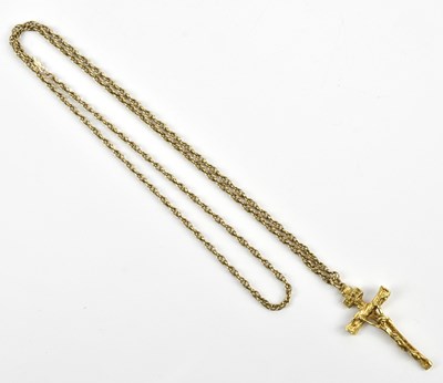 Lot 221 - A yellow metal crucifix, tests as 18ct gold,...