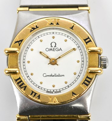 Lot 579 - OMEGA; a lady's bi-metal Constellation...