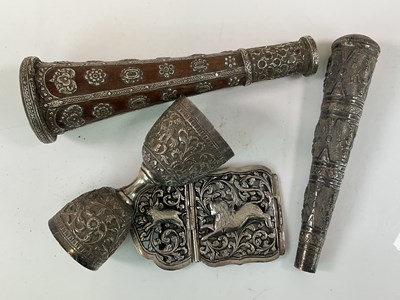 Lot 443 - An unusual Eastern white metal mounted wooden...