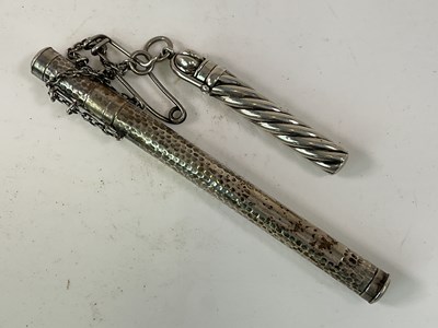 Lot 449 - SAMPSON MORDAN & CO; a cylindrical hammered...