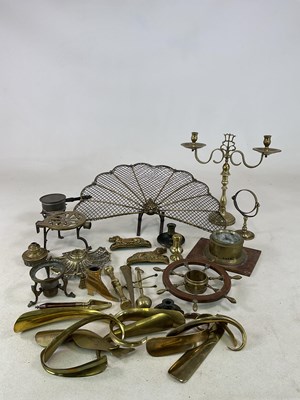 Lot 244 - A quantity of assorted brass, including shoe...