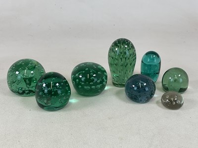Lot 325 - Eight 19th century glass dumps of various...