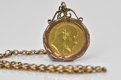 Lot 459 - An Edward VII full sovereign, 1905, in 9ct...
