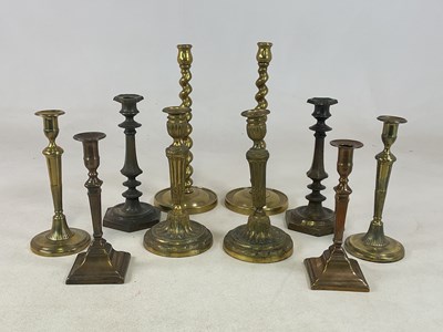 Lot 247 - Five pairs of decorative candlesticks, to...