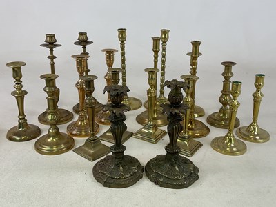 Lot 200 - A quantity of brass candlesticks, mostly in...