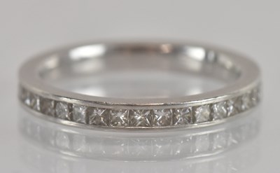 Lot 1227 - A modern platinum and diamond princess cut...