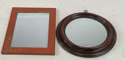 Lot 775 - Two small mirrors, one circular with mahogany...