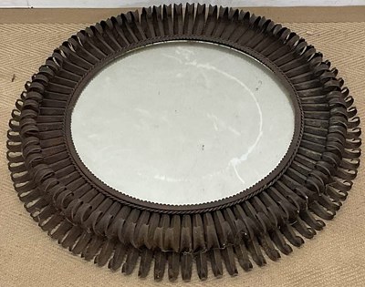 Lot 777 - A circular mirror in bespoke metal frame made...