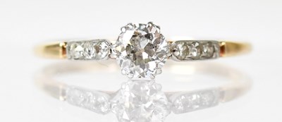 Lot 789 - An 18ct yellow gold diamond ring, with...