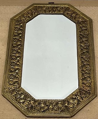 Lot 773 - A brass edged, baroque style mirror, with...